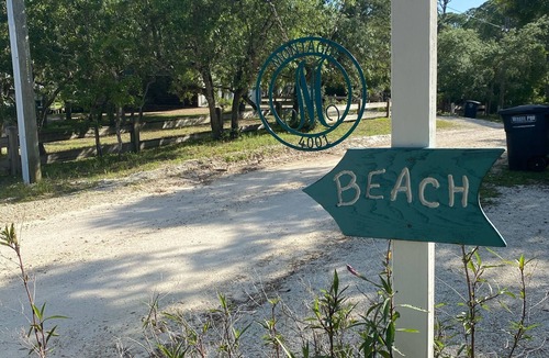 Panacea House | Secluded Oasis: 500' from Private Beach, Every Amenity for Ultimate Relaxation