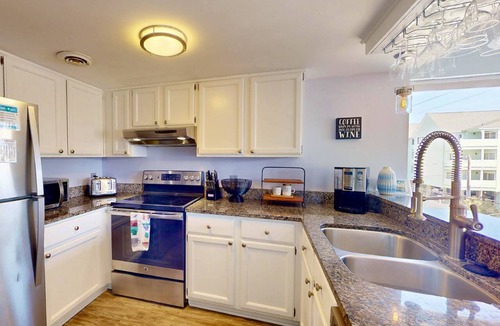 North Carolina Coast Condo | Second Row Ocean View, Pool, Close to Beach Access + CB Pier, Dog Friendly