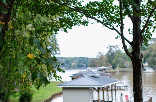 Eatonton House | Serene Lakefront Home with Private Dock, Hot Tub, Fire Pit and Boat!