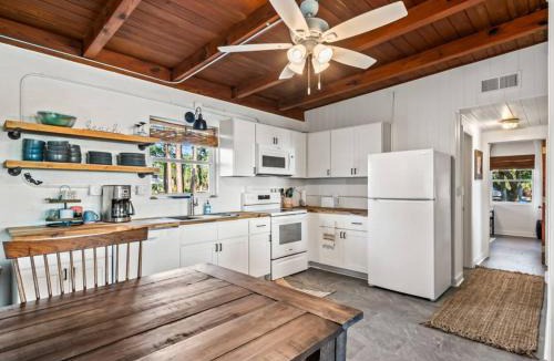 Panacea House | Shoreline Serenity- The Golden Goat On The Bay