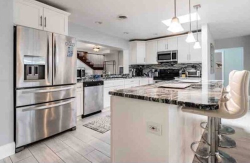 Harbor Bluffs House | Sleeps 16 with Hot Tub & Game Room located near IRB & Clearwater Beach!