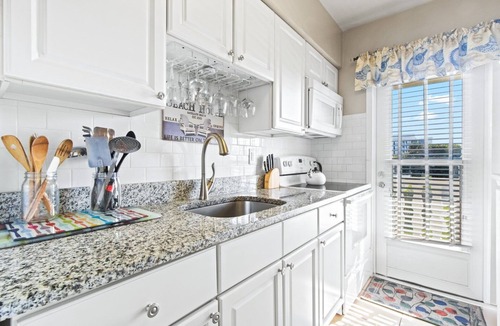 Satellite Beach Condo | Snowbird-Friendly Oceanside Condo — Heated Pool, Fire Pit & Beach Access! 🌴🌊