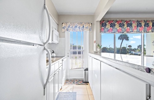 Satellite Beach Condo | Snowbird-Friendly Oceanside Condo — Heated Pool, Fire Pit & Beach Access! 🌴🌊