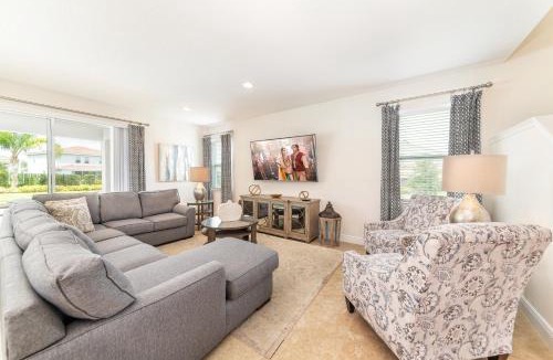 West Kissimmee Villa | Spacious Home by Rentyl Near Disney with Private Pool, Movie Room, Air Hockey Table & Resort Amenities - 530B