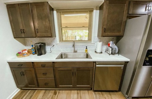 Parsons House | Spacious home in downtown Parsons! Conference room, HS internet, & private yard