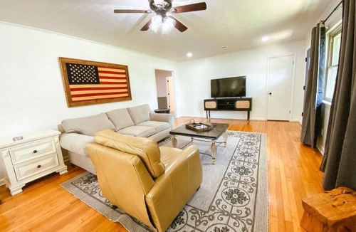 Parsons House | Spacious home in downtown Parsons! Conference room, HS internet, & private yard