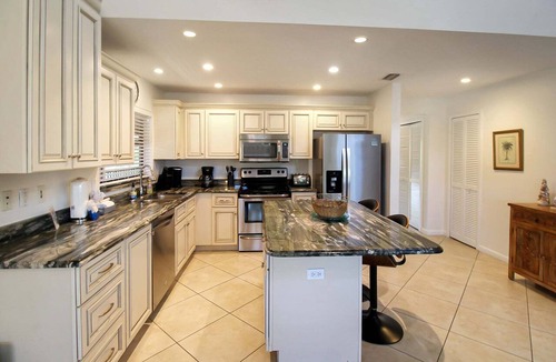 Sanibel Condo | Spacious Retreat with Wrap-Around Lanai and Private Beach - Pet Friendly - Signal Inn 14