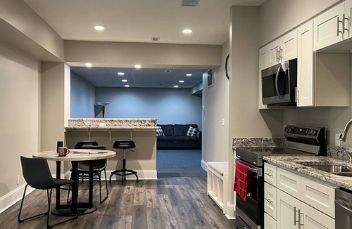 Concord Apartment | Spacious Split-Level, Basement Apt. w/Gorgeous Sunroom Overlooking Wooded Area.