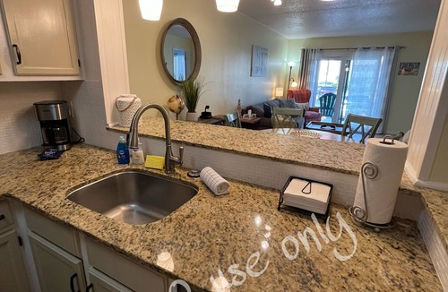 St. Augustine Beach Condo | St Augustine Beach Island Escape 2 bed,2 bath,1st floor condo steps to the beach