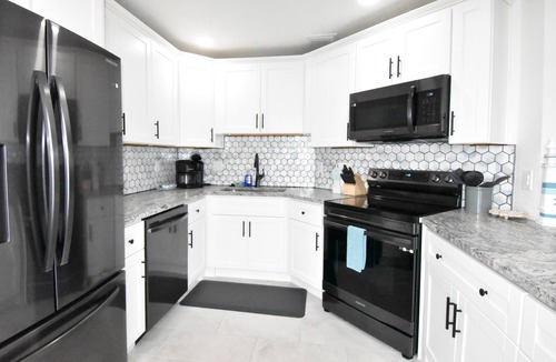 Cocoa Isles Country Club Condo | Stay Where Dolphins Play,Water Front