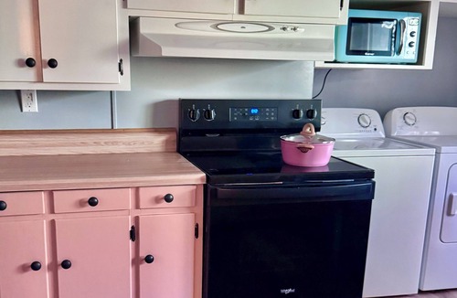 Aiken House | Step into the centrally located Cowgirl Cottage, a peaceful retreat on the woods