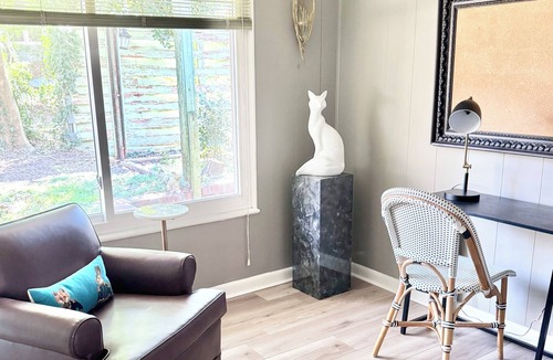 Aiken House | Step into the centrally located Cowgirl Cottage, a peaceful retreat on the woods