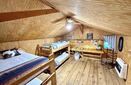 Revelo Resort | Step Into Your Own Western Town Cabins, Saloon, ATV Trails & Private Group Stays