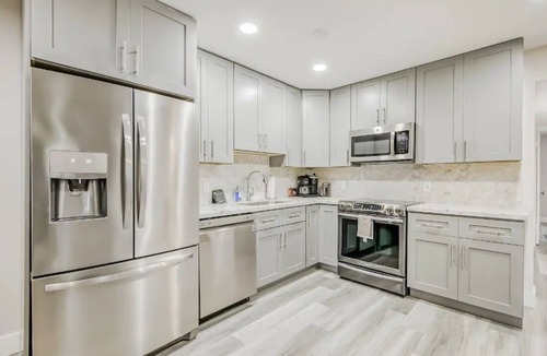Palm Beach Shores Condo | Steps to Beach: Hot Tub, Fire Pit & Dog-Friendly