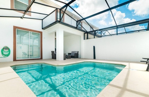 Kissimmee House | Storey Lake Resort 4 Bedroom Townhome Pet Friendly