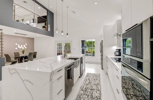 Rural Estates House | Stunning Naples home on 2 acres surrounded by beautiful palm trees and pool!