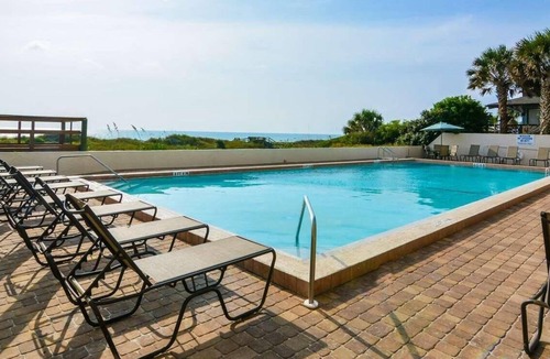 Crescent Beach Apartment | Stunning Seaside Studio Condo With King Bed & Heated Pool, Steps To Beach!