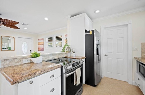 Riverside House | Stylish 2-Bedroom, 2-Bathroom Home with Pool – Just Steps from the Beach!