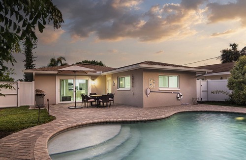 Naples Park House | SUMMER PROMOTION! Cute Designer Home, Heated Pool Oasis, Near Beach, FREE Bikes