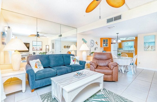 Avon By The Sea Condo | Sun-Kissed Escape: Steps to Pier w/Heated Pool & Private Balcony