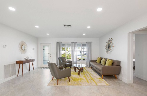 Garden Isles House | Sunny Canal, Modern waterfront 3 bedroom pool home