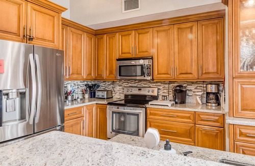Lake Worth House | Sunny home with private screened pool, spacious patio & fast WiFi