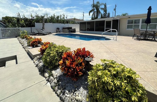 Sea Ranch On The Gulf House | Sunny Waterfront Oasis! Private Pool, Hot Tub & Dock!