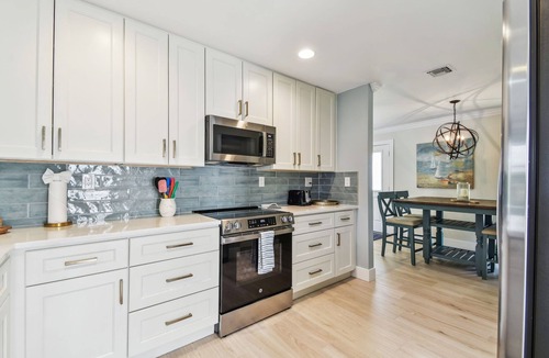 Siesta Key Village House | Sunnyside Up Cottage - Walk to Siesta Beach, Waterfront Home by Gulf Coast Holiday Homes