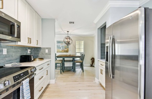 Siesta Key Village House | Sunnyside Up Cottage - Walk to Siesta Beach, Waterfront Home by Gulf Coast Holiday Homes