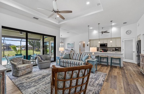 White Marsh House | Sunset Retreat with heated pool