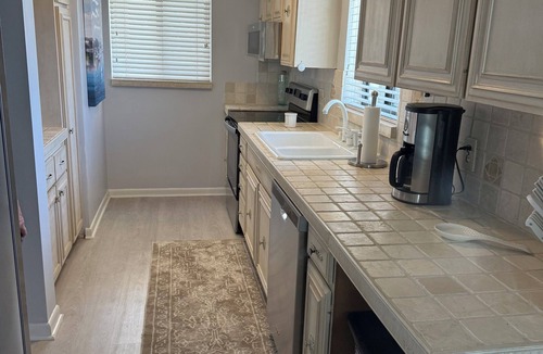 Stuart Condo | Sunsets and Palm Trees overlooking the St. Lucie River