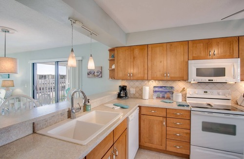 Cocoa Beach Condo | Sweet Cocoa Beach Remodeled Retreat ~ Heated Pool, Spa ~ 2 Sunny Balconies