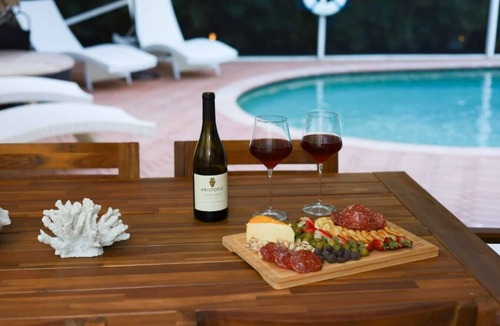 Greenacres Villa | The Utopia Resort Heated Pool Spa Waterfall BBQ Studio and more Hosted by Relaxtay