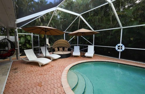 Greenacres Villa | The Utopia Resort Heated Pool Spa Waterfall BBQ Studio and more Hosted by Relaxtay