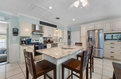 Cocoa Isles House | TIKI BLUE: 5 BedRm Beach House: Heated Pool + Hot Tub + Tiki Bar
