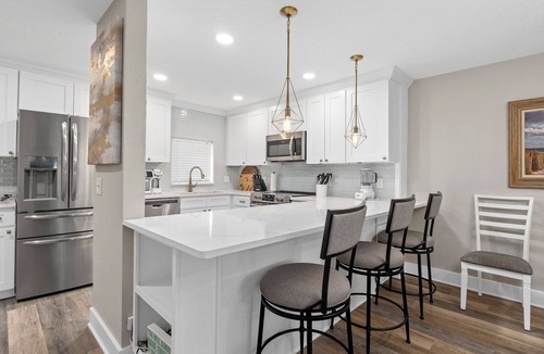 Crescent Beach Condo | Tradewinds 101 | Beachfront Condo with Patio, Pool View and Beach Access