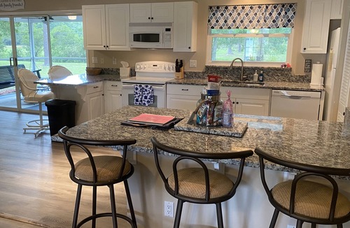 Vero Beach House | "Tropical Getaway" Peaceful, cozy, clean 3-2 home. Inviting back porch w swing.