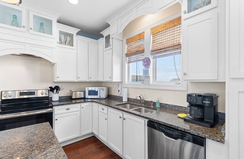 Holden Beach House | "Tropical Punch" Tastefully decorated 4 bedroom, 3.5 bathroom home w/a private pool.
