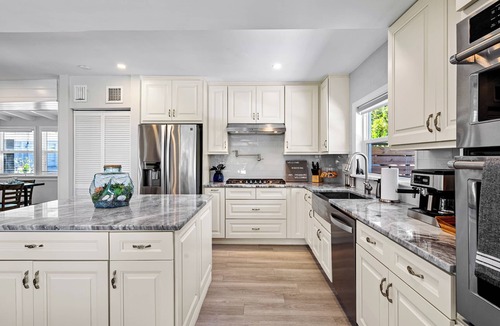 Tarpon River House | Tropical Waterfront Home - Pet Friendly & Heated Pool