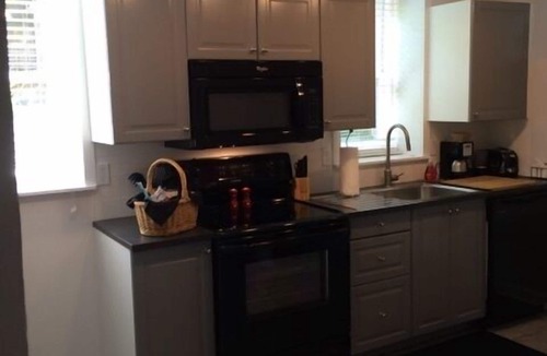 Governor's Walk House | Turn-Key Furnished Mid-Town Pool Side Bungalow