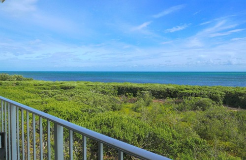 Tavernier Condo | Two Panoramic Ocean Views from the Living room and Master Bedroom in this Condo