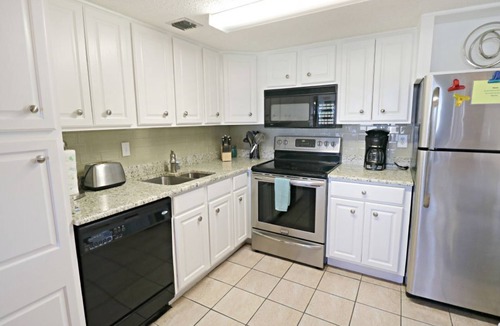 Crescent Beach Apartment | Updated, Ground Floor, STEPS from the Beach, Pool, Boat Ramp and Fishing Pier on