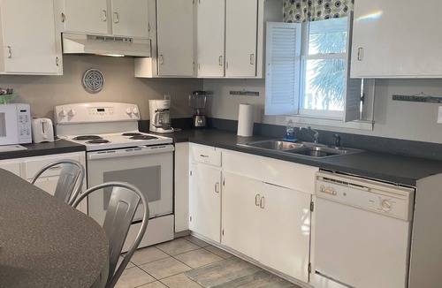 Holden Beach House | Upper unit canal home.Short walk to Holden Beach. See calendar for partial weeks