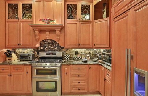 Naples House | Upscale waterfront home with private dock, saltwater pool, lanai, grill, & W/D