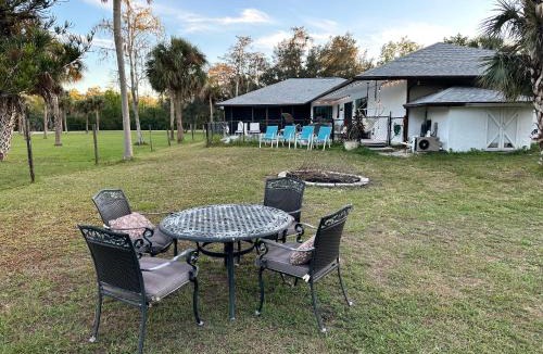 Naples House | Vacation pool home in the woods.