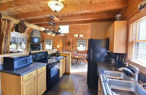 Clyde Cabin | “Wake Up to Bison Views – Cozy Log Cabin on a 65-Acre Private Ranch.”