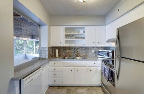 Middle River Terrace Apartment | Waterfront Apartment ~ Private Patio ~ Pool