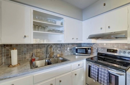 Middle River Terrace Apartment | Waterfront Apartment ~ Private Patio ~ Pool