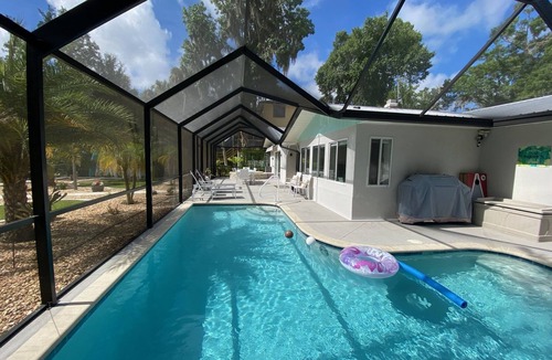 Crystal River House | Waterfront Paradise w dock, large patio, lanai, pool, hot tub! Bring your boat!