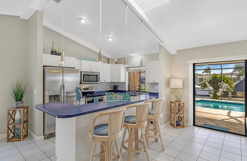 Fort Myers Villa | Waterfront Pet Friendly Villa, Heated Pool & Pool Table- Villa Nautical Breeze - Roelens Vacations